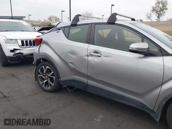 2018 Toyota C-HR XLE with VIN JTNKHMBX5J1011568, listed as a IAAI auction lot 42043867 with 30,699 mi miles. Bid and sale history available at carsss.com. Image 6.