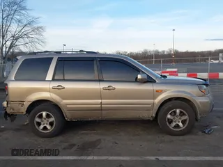 2007 Honda Pilot EX-L with VIN 2HKYF18667H509331, listed as a IAAI auction lot 41453510 with 228,746 mi miles and . Bid and sale history available at DreamBid. Image 13.