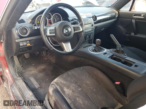 2007 Mazda MX-5 Miata Sport z VIN JM1NC25F970124896, wystawiony jako Copart lot #83624394 z przebiegiem 62 735 mil mil oraz Szkoda całkowita • Salvage title. Historia ofert i sprzedaży dostępna na DreamBid. Obrazek 8.