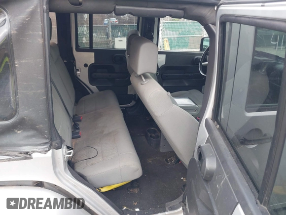 2008 Jeep Wrangler Unlimited Sahara with VIN 1J4GA59158L501099, listed as a IAAI auction lot 41743590 with 213,941 mi miles and . Bid and sale history available at DreamBid. Image 8.