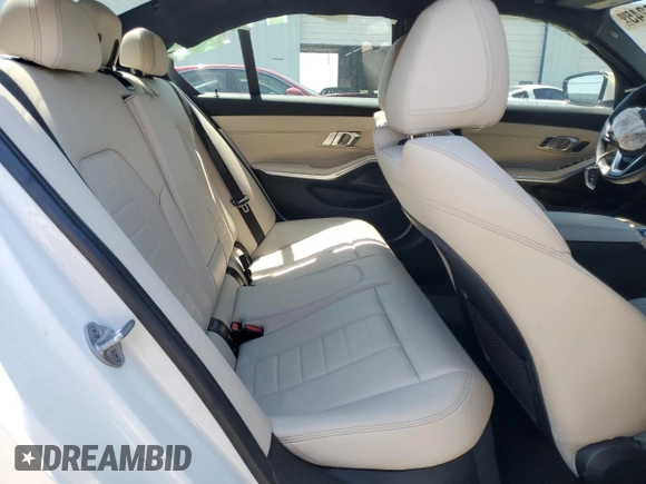 2021 BMW 3 Series 330i xDrive with VIN 3MW5R7J01M8B48136, listed as a Copart auction lot 52376245 with 47,411 mi miles and Salvage Title. Bid and sale history available at carsss.com. Image 10.