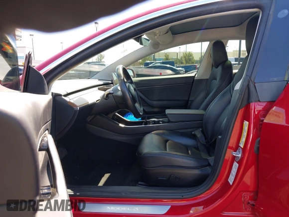 2018 Tesla Model 3 Long Range Battery with VIN 5YJ3E1EB5JF146184, listed as a IAAI auction lot 41808346 with 97,496 mi miles and . Bid and sale history available at DreamBid. Image 5.