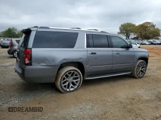 2018 Chevrolet Suburban Premier with VIN 1GNSCJKC5JR293962, listed as a Copart auction lot 50641835 with 137,598 mi miles and Salvage Title. Bid and sale history available at DreamBid. Image 3.