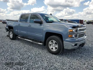 2015 Chevrolet Silverado 1500 LT with VIN 3GCUKREC8FG284565, listed as a Copart auction lot 52760805 with 128,501 mi miles and Salvage Title. Bid and sale history available at DreamBid. Image 4.