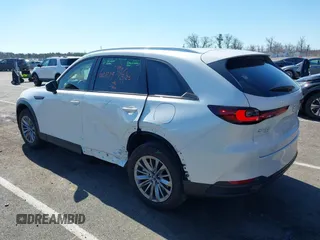 2024 Mazda CX-90 Preferred with VIN JM3KKBHD4R1175985, listed as a IAAI auction lot 41898640 with 7,359 mi miles and . Bid and sale history available at DreamBid. Image 3.