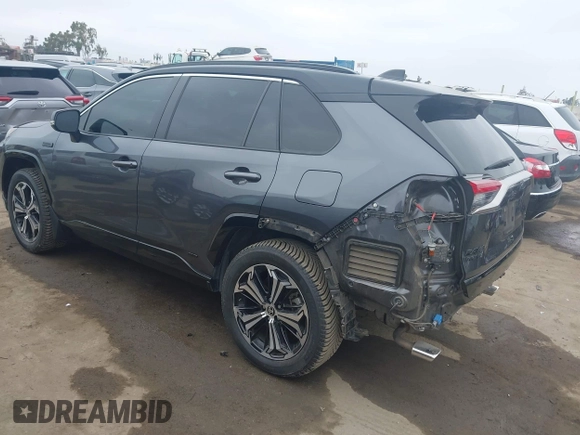 2021 Toyota RAV4 XSE with VIN JTMFB3FV7MD009432, listed as a IAAI auction lot 42439466 with 91,544 mi miles and . Bid and sale history available at DreamBid. Image 3.