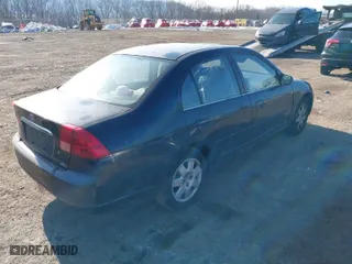 2002 Honda Civic EX with VIN 2HGES26842H549564, listed as a IAAI auction lot 41449790 with 137,844 mi miles. Bid and sale history available at carsss.com. Image 4.
