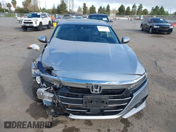 2021 Honda Accord Touring z VIN 1HGCV2F99MA032916, wystawiony jako IAAI lot #42019607 z przebiegiem 64 344 mil mil oraz . Historia ofert i sprzedaży dostępna na DreamBid. Obrazek 13.