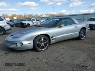 1999 Pontiac Firebird Firebird z VIN 2G2FS22K7X2214737, wystawiony jako Copart lot #77784414 z przebiegiem 93 670 mil mil oraz Czysty tytuł • Clean title. Historia ofert i sprzedaży dostępna na DreamBid. Obrazek 1.