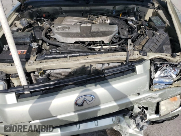 2001 Infiniti QX4 z VIN JNRDR09X51W201432, wystawiony jako Copart lot #54083295 z przebiegiem 211 929 mil mil oraz Szkoda całkowita • Salvage title. Historia ofert i sprzedaży dostępna na DreamBid. Obrazek 12.