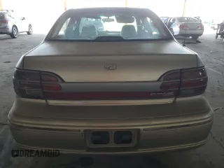 1999 Oldsmobile Cutlass GLS z VIN 1G3NG52M6X6308120, wystawiony jako Copart lot #73253814 z przebiegiem 100 224 mil mil oraz Tytuł czysty. Historia ofert i sprzedaży dostępna na DreamBid. Obrazek 6.
