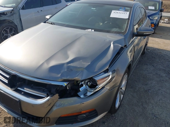 2010 Volkswagen CC Lux Limited Edition z VIN WVWHN7ANXAE565352, wystawiony jako IAAI lot #42032313 z przebiegiem 192 374 mil mil oraz . Historia ofert i sprzedaży dostępna na DreamBid. Obrazek 6.