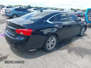 2014 Chevrolet Impala LT with VIN 1G1115SL5EU100447, listed as a IAAI auction lot 42604594 with 163,646 mi miles and . Bid and sale history available at DreamBid. Image 4.