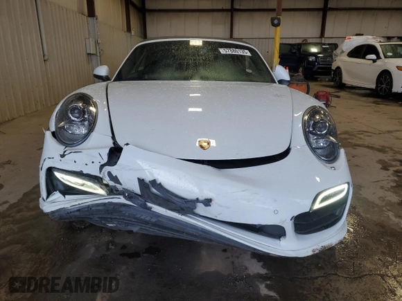 2015 Porsche 911 Turbo z VIN WP0CD2A91FS178328, wystawiony jako Copart lot #57880135 z przebiegiem 34 588 mil mil oraz Szkoda całkowita • Salvage title. Historia ofert i sprzedaży dostępna na DreamBid. Obrazek 5.