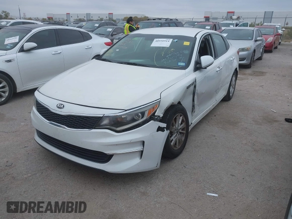 2016 Kia Optima LX with VIN KNAGT4L39G5104726, listed as a IAAI auction lot 40950914 with 128,728 mi miles. Bid and sale history available at carsss.com. Image 17.
