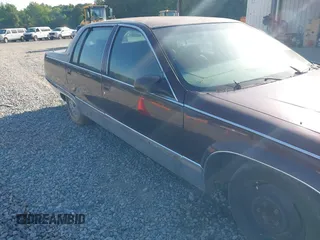 1996 Cadillac Fleetwood z VIN 1G6DW52PXTR713787, wystawiony jako IAAI lot #42079864 z przebiegiem Nie podano mil oraz . Historia ofert i sprzedaży dostępna na DreamBid. Obrazek 13.