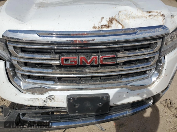 2023 GMC Acadia SLT with VIN 1GKKNML43PZ251864, listed as a Copart auction lot 44423355 with 19,879 mi miles and Salvage Title. Bid and sale history available at DreamBid. Image 12.