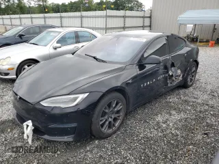 2021 Tesla Model S Long Range z VIN 5YJSA1E52MF428191, wystawiony jako Copart lot #57472425 z przebiegiem Nie podano mil oraz Szkoda całkowita • Salvage title. Historia ofert i sprzedaży dostępna na DreamBid. Obrazek 1.