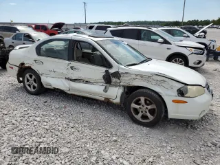 2001 Nissan Maxima SE 20th Anniversary. z VIN JN1CA31A51T310134, wystawiony jako Copart lot #66530384 z przebiegiem 172 384 mil mil oraz Szkoda całkowita • Salvage title. Historia ofert i sprzedaży dostępna na DreamBid. Obrazek 4.