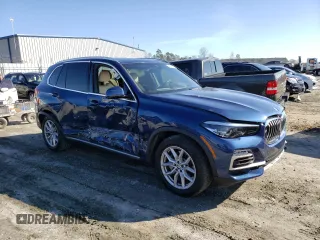2021 BMW X5 xDrive40i with VIN 5UXCR6C02M9G43082, listed as a Copart auction lot 36675453 with 23,876 mi miles. Bid and sale history available at carsss.com. Image 4.