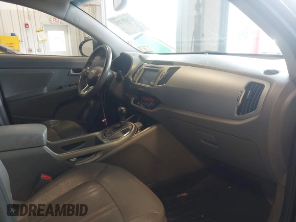 2012 Kia Sportage EX with VIN KNDPCCA2XC7311504, listed as a IAAI auction lot 42330710 with 170,638 mi miles and . Bid and sale history available at DreamBid. Image 5.