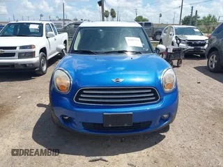 2014 MINI Countryman with VIN WMWZB3C52EWR40215, listed as a IAAI auction lot 42687571 with 106,338 mi miles and . Bid and sale history available at DreamBid. Image 6.
