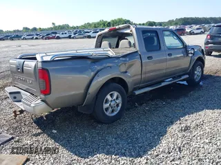 2003 Nissan Frontier SE z VIN 1N6ED29X43C402027, wystawiony jako IAAI lot #42252471 z przebiegiem 104 233 mil mil oraz . Historia ofert i sprzedaży dostępna na DreamBid. Obrazek 4.