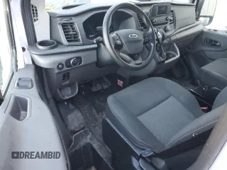 2021 Ford Transit Cargo with VIN 1FTBR1Y83MKA70780, listed as a Copart auction lot 77207664 with Not Provided miles and Clean Title. Bid and sale history available at DreamBid. Image 8.