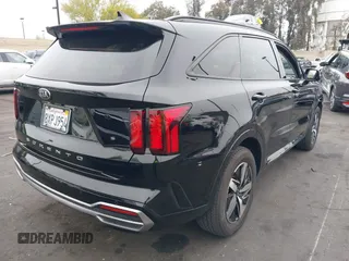 2021 Kia Sorento S with VIN 5XYRL4LC1MG066939, listed as a IAAI auction lot 42141340 with 53,937 mi miles and . Bid and sale history available at DreamBid. Image 4.