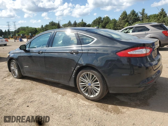 2013 Ford Fusion SE Hybrid с VIN 3FA6P0LU2DR181215, выставлен на аукционе Copart как лот 62474965 с пробегом 149 492 миль миль и Списание • Salvage title. История ставок и продаж доступна на DreamBid. Изображение 2.