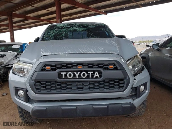 2019 Toyota Tacoma 4WD SR with VIN 3TMCZ5ANXKM225066, listed as a IAAI auction lot 41825265 with 75,908 mi miles. Bid and sale history available at carsss.com. Image 12.