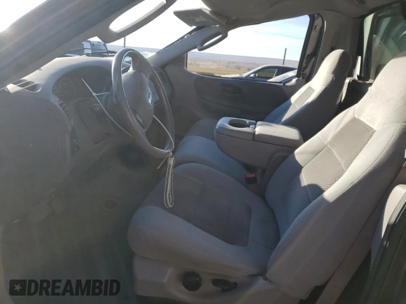 2003 Ford F-150 XL with VIN 1FTRF072X3KC94240, listed as a Copart auction lot 86130954 with 101,042 mi miles and Salvage title. Bid and sale history available at DreamBid. Image 7.