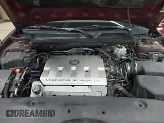2002 Cadillac DeVille with VIN 1G6KD54Y12U214732, listed as a IAAI auction lot 42018412 with 139,474 mi miles. Bid and sale history available at carsss.com. Image 10.