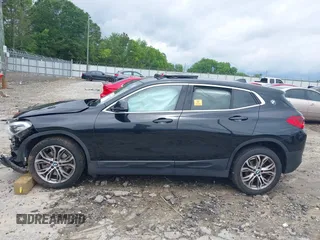 2018 BMW X2 sDrive28i z VIN WBXYJ3C31JEJ84394, wystawiony jako IAAI lot #42364160 z przebiegiem Nie podano mil oraz . Historia ofert i sprzedaży dostępna na DreamBid. Obrazek 14.