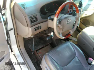 2007 Toyota Sienna XLE z VIN 5TDZK22C57S090127, wystawiony jako IAAI lot #41889083 z przebiegiem 136 191 mil mil oraz . Historia ofert i sprzedaży dostępna na DreamBid. Obrazek 12.