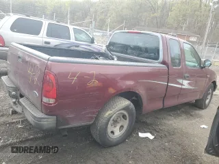 1998 Ford F-150 with VIN 1FTZX1727WNB55284, listed as a Copart auction lot 51781465 with 258,600 mi miles and Salvage title. Bid and sale history available at DreamBid. Image 3.