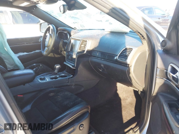 2017 Jeep Grand Cherokee Trailhawk with VIN 1C4RJFLT4HC657682, listed as a IAAI auction lot 41286507 with 123,646 mi miles and . Bid and sale history available at DreamBid. Image 5.