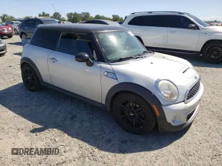 2013 MINI Hardtop S with VIN WMWSV3C50DT477287, listed as a Copart auction lot 56998445 with 238,282 mi miles and Clean Title. Bid and sale history available at DreamBid. Image 4.