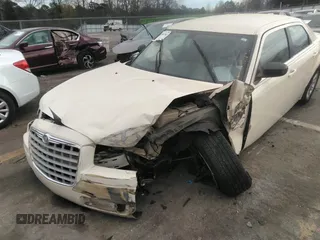 2009 Chrysler 300 LX with VIN 2C3KA43D79H554452, listed as a IAAI auction lot 38252211 with Not Provided miles and . Bid and sale history available at DreamBid. Image 6.