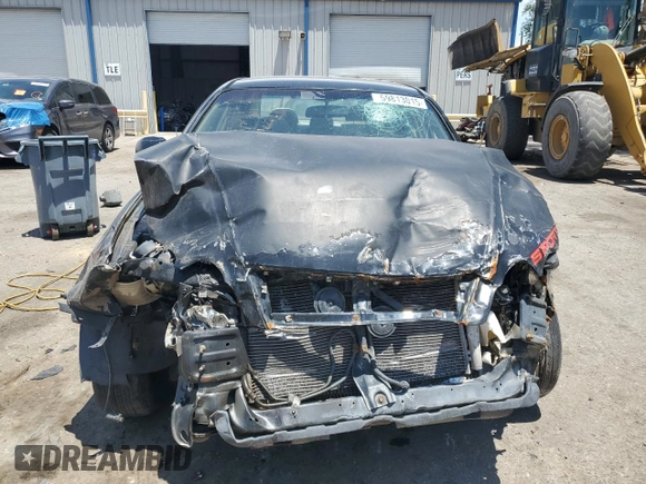 2006 Kia Optima LX z VIN KNAGD126865452524, wystawiony jako Copart lot #59813015 z przebiegiem 130 090 mil mil oraz Szkoda całkowita • Salvage title. Historia ofert i sprzedaży dostępna na DreamBid. Obrazek 5.