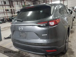 2019 Mazda CX-9 Touring with VIN JM3TCBCY3K0305147, listed as a IAAI auction lot 41676425 with 104,265 mi miles and . Bid and sale history available at carsss.com. Image 16.