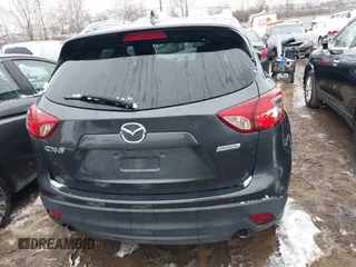 2014 Mazda CX-5 Touring with VIN JM3KE2CY2E0407453, listed as a IAAI auction lot 41564916 with 104,852 mi miles. Bid and sale history available at carsss.com. Image 15.