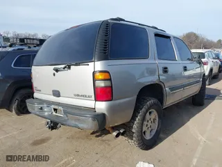 2004 Chevrolet Tahoe LT with VIN 1GNEC13Z24R307482, listed as a IAAI auction lot 41387538 with 322,339 mi miles. Bid and sale history available at carsss.com. Image 4.