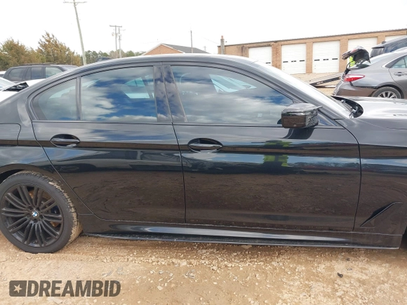 2019 BMW 5 Series M550i xDrive with VIN WBAJB9C56KB464957, listed as a IAAI auction lot 41729334 with Not provided miles and . Bid and sale history available at DreamBid. Image 13.