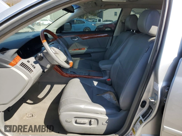 2007 Toyota Avalon XL z VIN 4T1BK36BX7U194144, wystawiony jako Copart lot #48680825 z przebiegiem 189 497 mil mil oraz Szkoda całkowita • Salvage title. Historia ofert i sprzedaży dostępna na DreamBid. Obrazek 7.