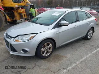 2014 Ford Focus SE with VIN 1FADP3F24EL285126, listed as a IAAI auction lot 41956143 with 113,415 mi miles. Bid and sale history available at carsss.com. Image 2.