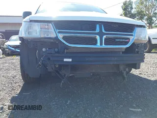 2019 Dodge Journey SE Value with VIN 3C4PDCAB2KT810207, listed as a IAAI auction lot 40991409 with Not Provided miles and . Bid and sale history available at DreamBid. Image 17.