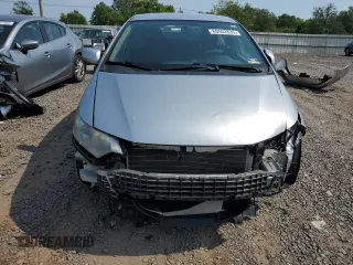 2010 Honda Insight EX with VIN JHMZE2H77AS015329, listed as a Copart auction lot 60502835 with 213,397 mi miles and Clean title. Bid and sale history available at DreamBid. Image 5.