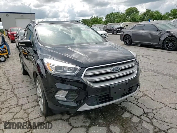 2018 Ford Escape Titanium with VIN 1FMCU0J92JUC84901, listed as a Copart auction lot 60428635 with 69,210 mi miles and Salvage title. Bid and sale history available at DreamBid. Image 15.