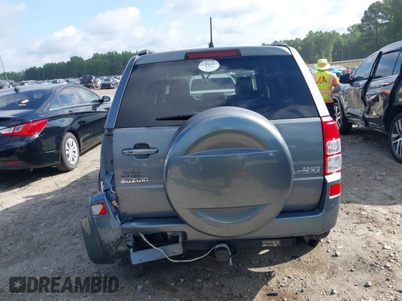 2006 Suzuki Grand Vitara Luxury z VIN JS3TE947864103082, wystawiony jako IAAI lot #42470917 z przebiegiem 155 702 mil mil oraz . Historia ofert i sprzedaży dostępna na DreamBid. Obrazek 17.